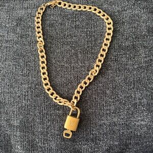 Vintage repurposed Louis Vuitton lock with gold plated chain